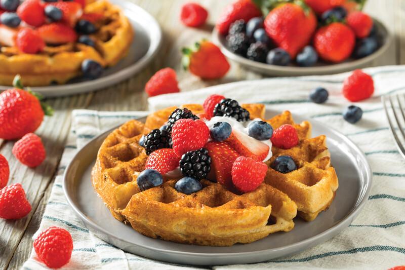Sweet Homemade Berry Belgian Waffle with Whipped Cream