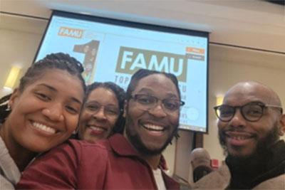 B.E.A.M. members posing together at an event